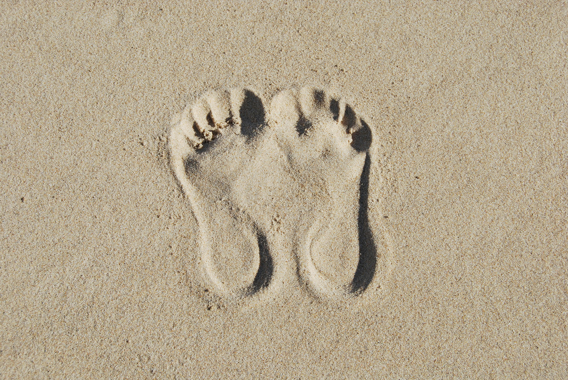 Fußabdrücke im Sand